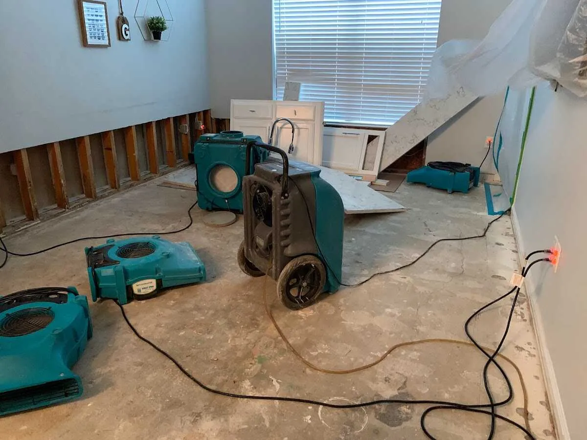 Dehumidifier in flood-cut room for Water Damage Restoration in Brandon